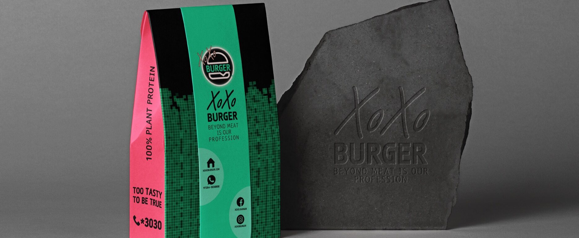 הדמיית אריזה של XOXO Burger בצבעי שחור, ירוק וורוד