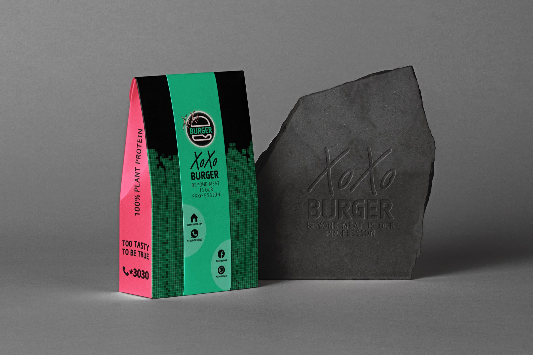 הדמיית אריזה של XOXO Burger בצבעי שחור, ירוק וורוד